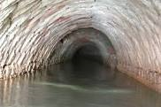 مطالعه عددی اندركنش تونل های زیر سطح آب زیرزمینی و زمین اطراف